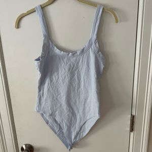 Forever 21 Baby Blue Round Beck Body Suit